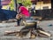 African women cooking meal over simple wood fire at Albert Schwe