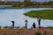 African women wash clothes on the shore of Lake Victoria