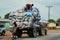 African Workers moving the Heavy Bags on Ghana Road