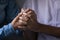 African young couple holding hands close up