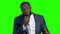 Afro-American entertainer talking on green screen.