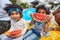 Afro-American Family\\\'s Poolside Watermelon Feast with Laughter and Love