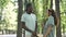 Afro-American man and brunette white woman do high-five