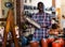 Afro-american seller offers handmade pottery in the store