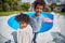 Afro-American Siblings Share Joy by the Poolside