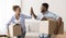 Afro Couple Giving High-Five Carrying Moving Boxes Entering New House