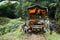 Afro-Ecuadorian men turning a `ghost train` in the jungle