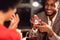 Afro Man Giving Girlfriend Engagement Ring, Romantic Date In Restaurant