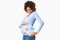 Afro pregnant woman holding pink and blue color card