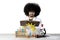 Afro scientist reading a book on studio