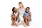 Afro twin child posing on a white background studio with white mother