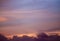 Afterglow clouds over the Caribbean sea on a beach