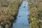 Aftermath of natural disaster. Surrounded by hurricane rainfall flood waters homes in Florida residential area