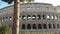 Afternoon panning shot of the colosseum, rome