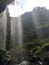 An afternoon, a shower under a waterfall, blue sky