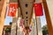 Afternoon sunny view of some international flags hangin in the VKC Library of USC