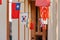 Afternoon sunny view of some international flags hangin in the VKC Library of USC