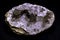 agate semigem geode with crystals isolated on black background