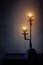 Aged candlestick with warm candle light in dark corner