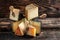 Aged cheese, Spanish, hard cheese composition with cheese knife. traditional pieces of Spanish, French, Italy cheese