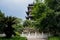 Aged Chinese tower in blue summer sky