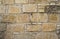 Aged coquina Stone wall texture or background