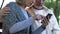 Aged couple using modern smartphone, lack of skills, difficult technologies