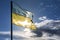 Aged flag of Ukraine against the background of the sun, victory in the struggle for independence