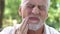 Aged male feeling terrible toothache, dental illness, lack of calcium, caries