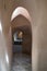 Aged narrow stone vaulted passage, historical traditional Hamam Inal public bathhouse, Cairo, Egypt