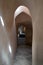 Aged narrow stone vaulted passage, historical traditional Hamam Inal public bathhouse, Cairo, Egypt