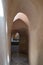 Aged narrow stone vaulted passage, historical traditional Hamam Inal public bathhouse, Cairo, Egypt