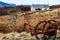 Aged, rust-covered plow on a rural field in Isle of Skye, Scotland, UK