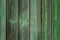 Aged shabby green wooden planks