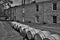 Aged whiskey, scotch, bourbon barrels in Kentucky ready for transportation in black and white