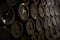 Aged wine bottles covered with mold in vintage wine cellar