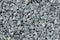Aggregate / gravel pattern - a heap of coarse gray stones, crushed at a stone pit