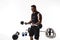 Aggressive bearded strong muscular Man in sportswear workout with barbell on white isolate