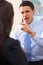 Aggressive Businessman Shouting At Female Colleague