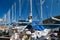 Agia Efimia, Cephalonia island, Greece - July, 14 2019: White yachts for rent against blue sky at a berth in Agia Efimia