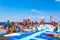 AGIA NAPA, CYPRUS, AUGUST 30, 2017: Tourists sitting on an upper deck of a ferry travelling near Cape Greco, Cyprus