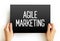 Agile Marketing - approach to marketing that utilizes the principles and practices of agile methodologies, text concept on card