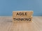 Agile thinking symbol. Concept words Agile thinking on brick blocks. Beautiful wooden table