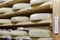 Aging Cheese at the maturing cellar Franche dairy Comte