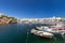 AGIOS NIKOLAUS, GREECE - SEPTEMBER 10, 2019: Lake Vulismeni with boats in the foreground