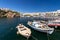 AGIOS NIKOLAUS, GREECE - SEPTEMBER 10, 2019: Lake Vulismeni with boats in the foreground