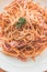 Aglio Olio Peperoncino Linguine & chicken strips tossed with olive oil, garlic and chilli flakes.  Topped with parmesan cheese and