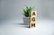 AGM Annual general meeting acronym on wooden cubes on dark wooden backround. Business concept