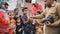 Agra, India - December 12, 2018: Banana treats for children from poor areas of Agra city.