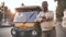 Agra, India - December 12, 2018: Indian auto rickshaw tut-tuk driver man